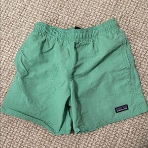Boys green Patagonia swim trunks, in perfect condition